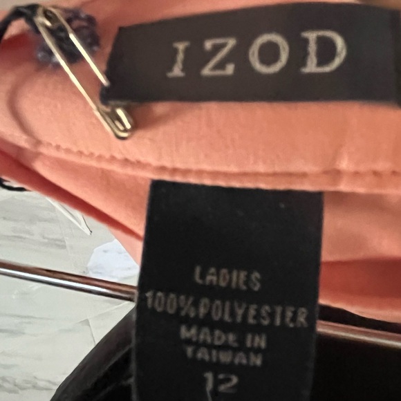 Izod ladies golf 2 piece skort & jacket set. Jacket size small, skort size 12 - Picture 7 of 7